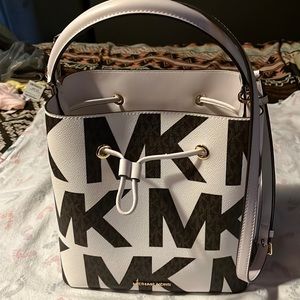 Authentic MK small bucket bag. Like new. Used a couple times.